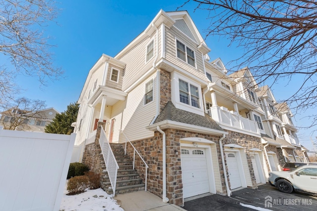 view of front of property with a garage