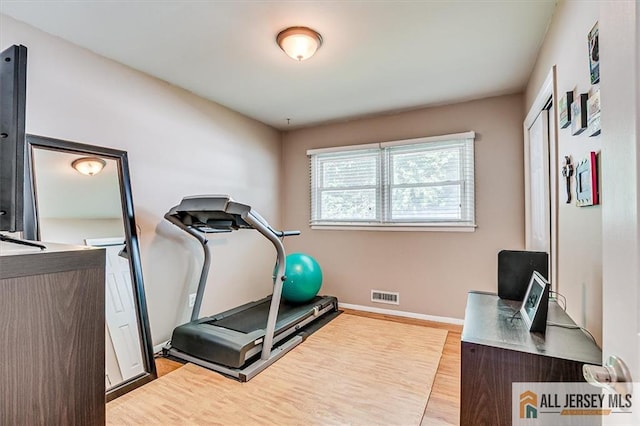 20 Melville Rd, Edison, NJ 08817 - exercise room with wood finished floors and baseboards