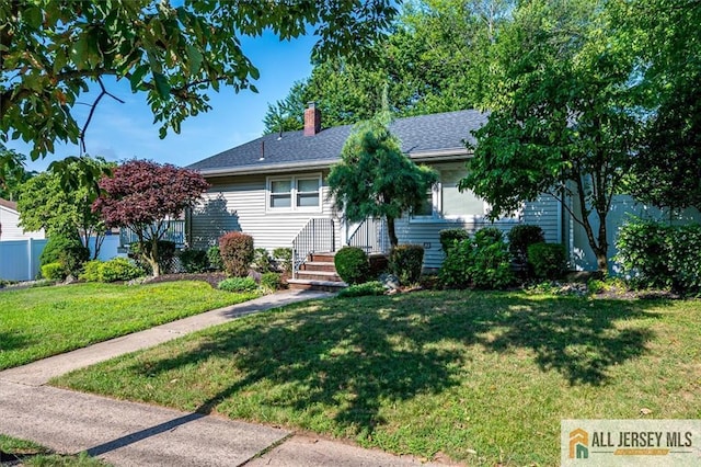 20 Melville Rd, Edison, NJ 08817 - view of front of home with a chimney