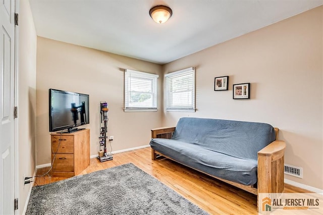 20 Melville Rd, Edison, NJ 08817 - living area featuring wood finished floors and baseboards