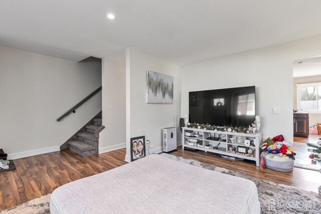 living room featuring dark hardwood / wood-style flooring