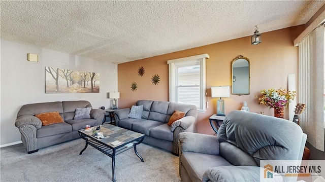 living room featuring carpet flooring, a textured ceiling, and baseboards