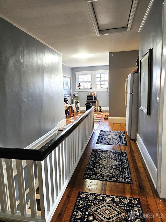 402 Raritan Ave, Middlesex, NJ 08846 - hall featuring attic access, hardwood / wood-style flooring, baseboards, and ornamental molding