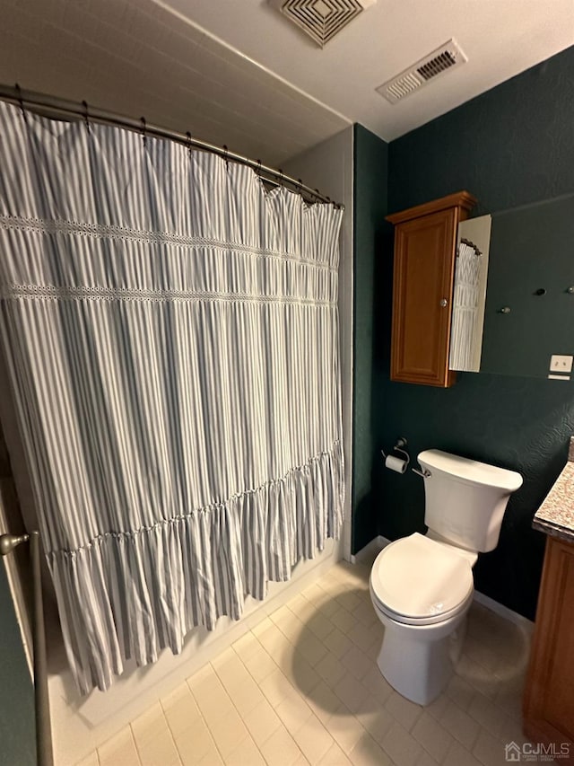 full bathroom with vanity, shower / bathtub combination with curtain, tile patterned floors, and toilet