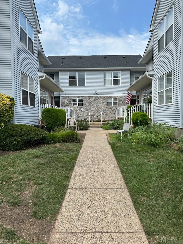 exterior space with a lawn