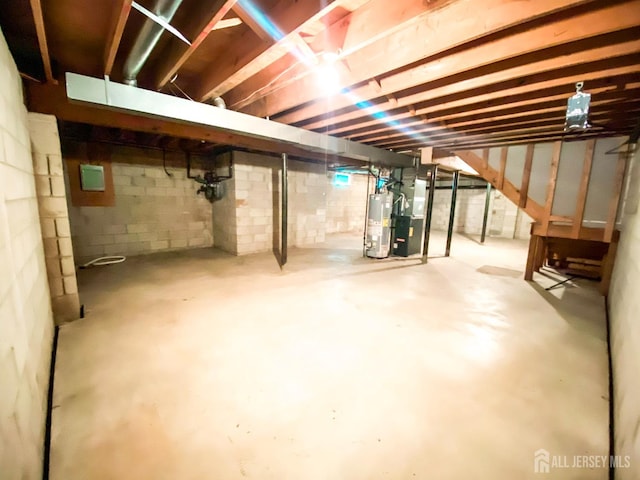 33 Foxhall St Unit B, Middlesex, NJ 08846 - unfinished below grade area featuring gas water heater and heating unit