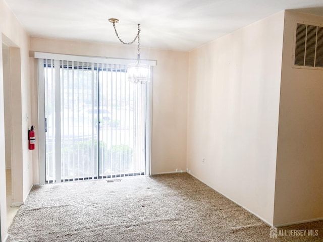 33 Foxhall St Unit B, Middlesex, NJ 08846 - carpeted empty room with a chandelier