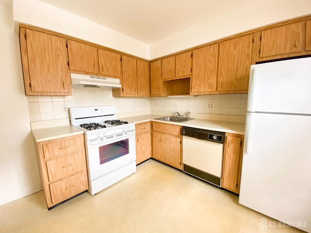 33 Foxhall St Unit B, Middlesex, NJ 08846 - kitchen with white appliances, under cabinet range hood, light countertops, and tasteful backsplash