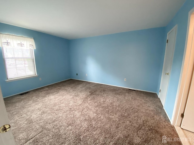 33 Foxhall St Unit B, Middlesex, NJ 08846 - empty room with carpet and baseboards