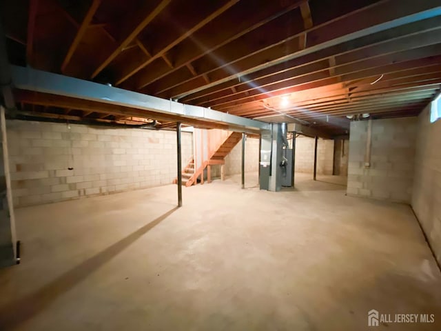 33 Foxhall St Unit B, Middlesex, NJ 08846 - unfinished basement featuring stairway and heating unit