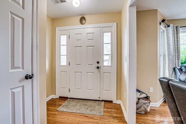 169 Metuchen Ave, Woodbridge Proper, NJ 07095 - foyer entrance featuring light wood-type flooring and baseboards