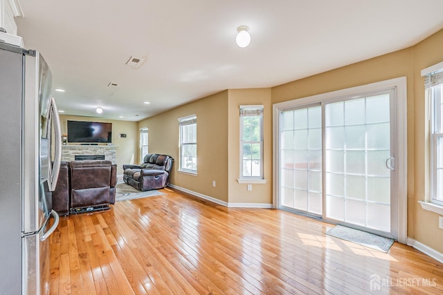 169 Metuchen Ave, Woodbridge Proper, NJ 07095 - living area featuring a fireplace, light wood-type flooring, and recessed lighting