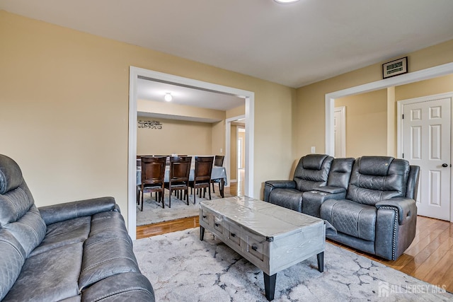 169 Metuchen Ave, Woodbridge Proper, NJ 07095 - living room with light wood-style floors