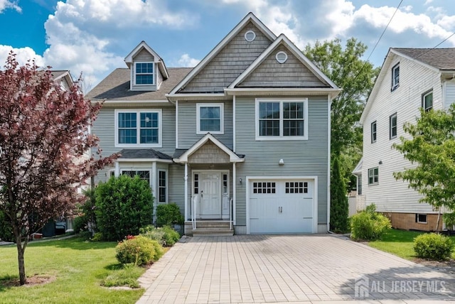 169 Metuchen Ave, Woodbridge Proper, NJ 07095 - view of front of house with an attached garage, decorative driveway, and a front yard
