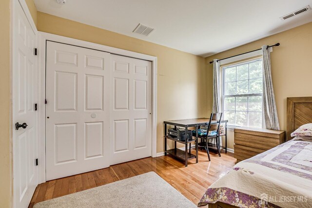169 Metuchen Ave, Woodbridge Proper, NJ 07095 - bedroom with light wood-type flooring and a closet