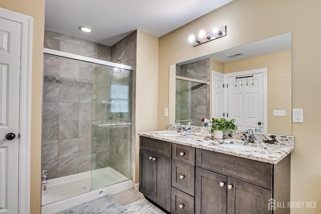 169 Metuchen Ave, Woodbridge Proper, NJ 07095 - full bathroom with a shower stall and double vanity