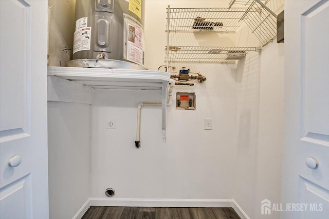 laundry room featuring hookup for a washing machine, electric dryer hookup, dark hardwood / wood-style floors, and water heater