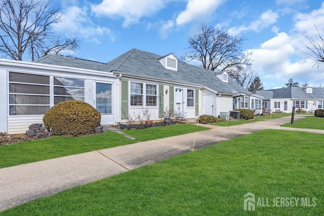 162 Providence Way, Monroe, NJ 08831 - new england style home featuring a front lawn, cooling unit, and a shingled roof