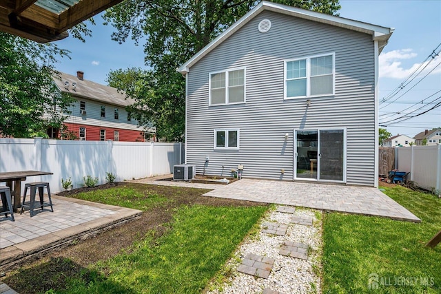 1142 Warren St, Roselle, NJ 07203 - back of house featuring a patio area and a fenced backyard