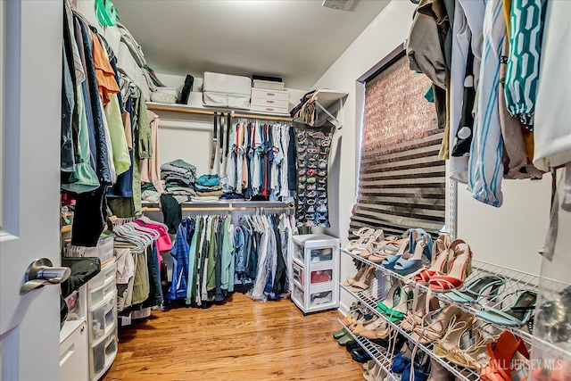 1142 Warren St, Roselle, NJ 07203 - spacious closet with wood finished floors