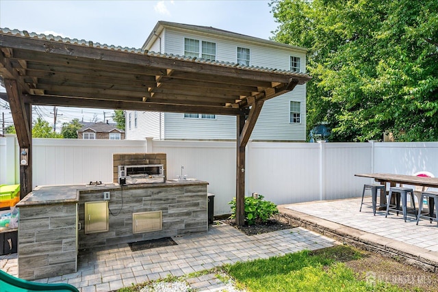 1142 Warren St, Roselle, NJ 07203 - fenced backyard with a patio, area for grilling, and a pergola