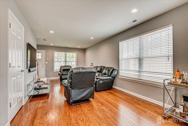 1142 Warren St, Roselle, NJ 07203 - living room with wood finished floors and recessed lighting