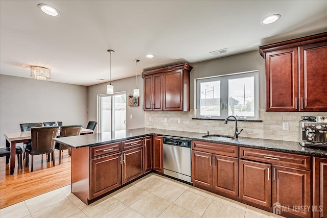 1142 Warren St, Roselle, NJ 07203 - kitchen with dishwasher, a peninsula, healthy amount of natural light, decorative backsplash, and recessed lighting