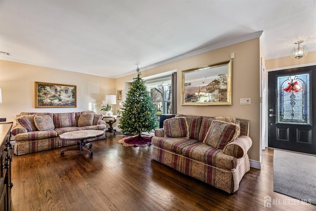 living room with crown molding and dark hardwood / wood-style floors