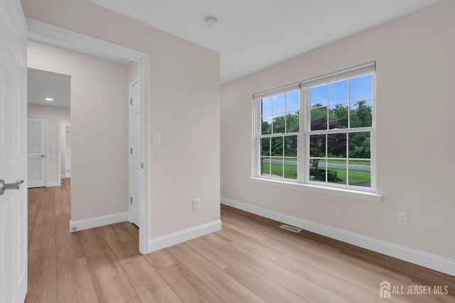 3 Malibu Ct, Jackson, NJ 08527 - spare room featuring light wood-style flooring and a smoke detector