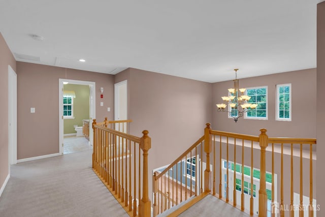 3 Malibu Ct, Jackson, NJ 08527 - hall with an upstairs landing, attic access, plenty of natural light, carpet, and recessed lighting