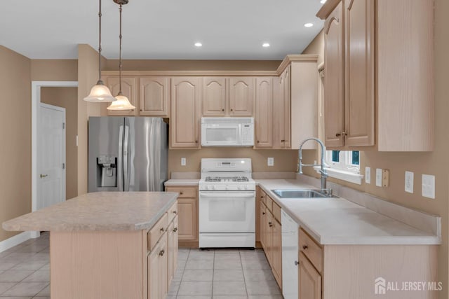3 Malibu Ct, Jackson, NJ 08527 - kitchen with white appliances, light brown cabinets, light tile patterned floors, light countertops, and recessed lighting