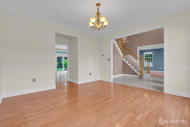 3 Malibu Ct, Jackson, NJ 08527 - empty room with a chandelier, stairs, wood finished floors, and crown molding