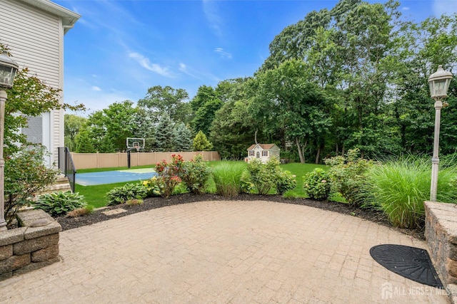 3 Malibu Ct, Jackson, NJ 08527 - view of patio / terrace with a shed, basketball court, and view of scattered trees