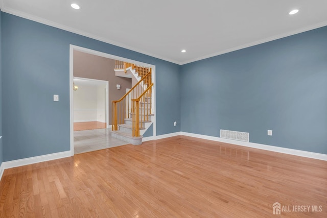 3 Malibu Ct, Jackson, NJ 08527 - empty room with stairs, ornamental molding, wood finished floors, and recessed lighting