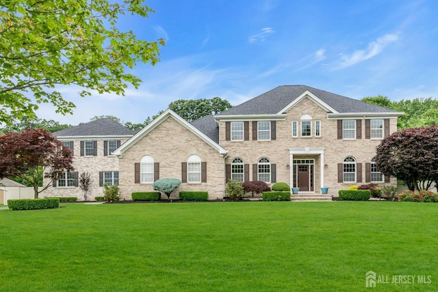 3 Malibu Ct, Jackson, NJ 08527 - view of front of house featuring a front yard and a shingled roof