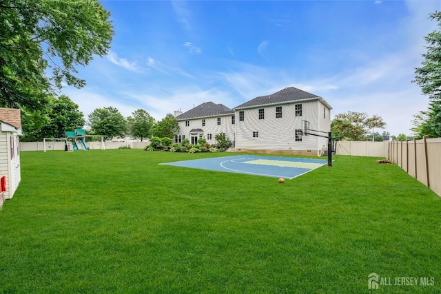 3 Malibu Ct, Jackson, NJ 08527 - back of house featuring basketball hoop, a fenced backyard, a playground, and crawl space