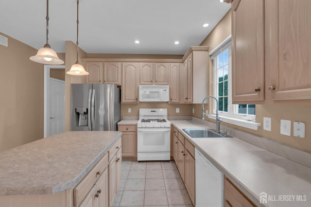 3 Malibu Ct, Jackson, NJ 08527 - kitchen with white appliances, light brown cabinets, light countertops, light tile patterned flooring, and recessed lighting