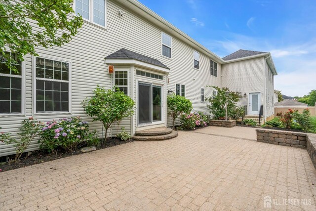 3 Malibu Ct, Jackson, NJ 08527 - rear view of house featuring a patio area