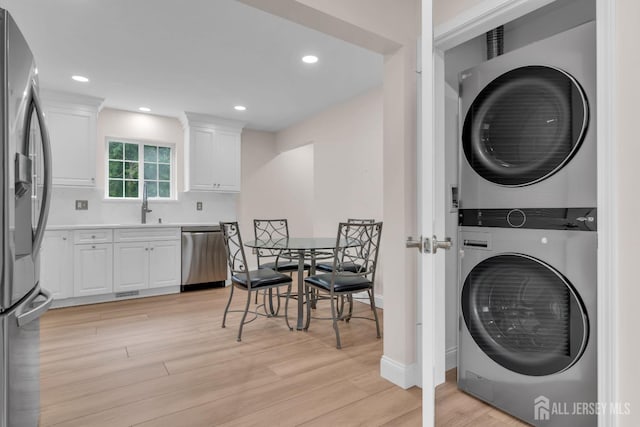 3 Malibu Ct, Jackson, NJ 08527 - washroom with stacked washing machine and dryer, light wood-type flooring, and recessed lighting