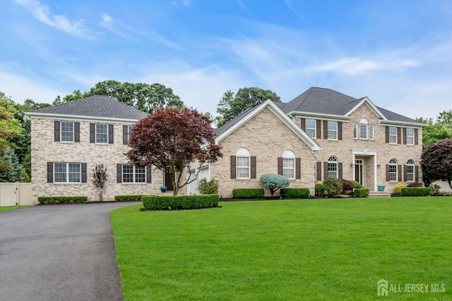 3 Malibu Ct, Jackson, NJ 08527 - colonial house with brick siding and a shingled roof