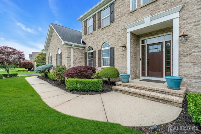 3 Malibu Ct, Jackson, NJ 08527 - entrance to property with a yard and brick siding
