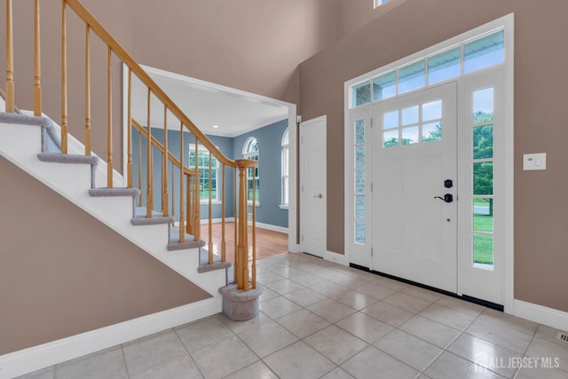 3 Malibu Ct, Jackson, NJ 08527 - foyer entrance featuring tile patterned flooring, stairs, and a high ceiling