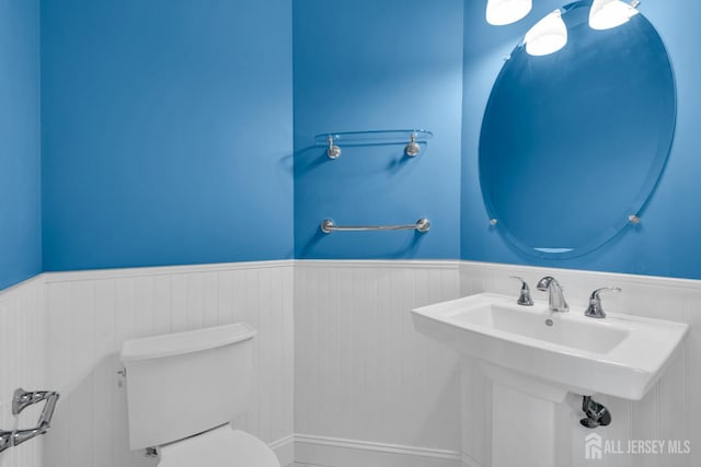 3 Malibu Ct, Jackson, NJ 08527 - bathroom featuring a wainscoted wall and toilet