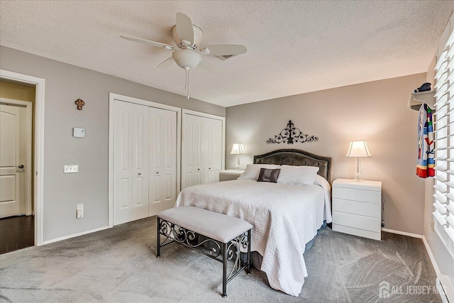106-B Hemlock Plz, Monroe, NJ 08831 - bedroom with two closets, carpet, a ceiling fan, and a textured ceiling