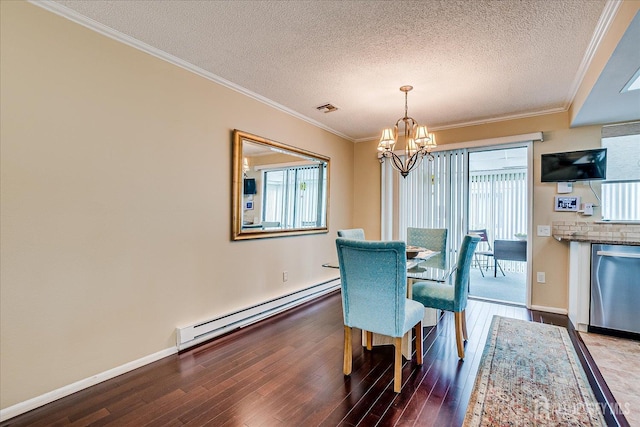 106-B Hemlock Plz, Monroe, NJ 08831 - dining area with baseboard heating, a chandelier, wood finished floors, a textured ceiling, and ornamental molding