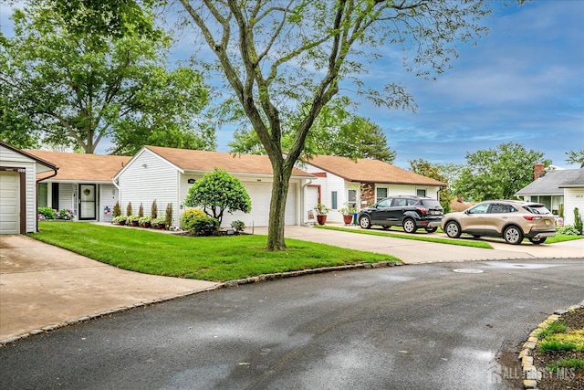 106-B Hemlock Plz, Monroe, NJ 08831 - single story home with a garage, driveway, and a front lawn
