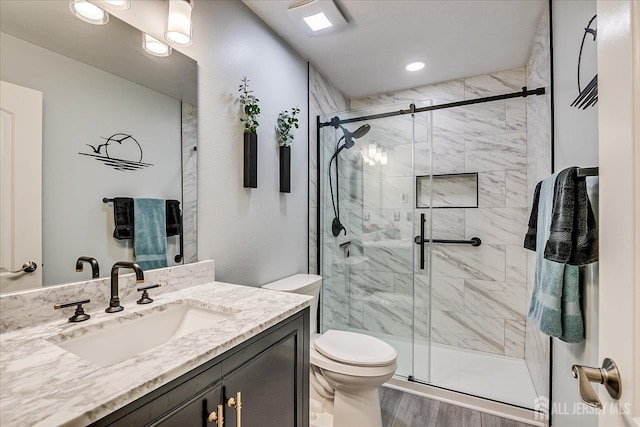 106-B Hemlock Plz, Monroe, NJ 08831 - bathroom featuring vanity, wood finished floors, a stall shower, and recessed lighting