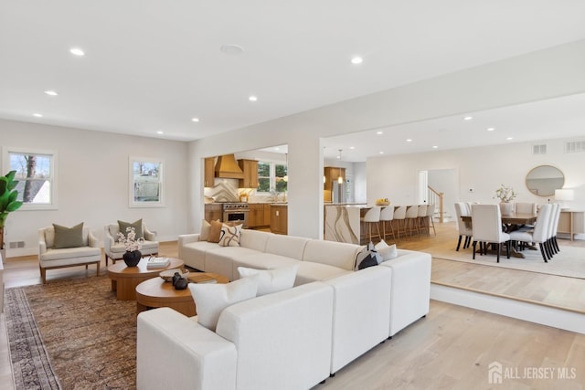 living room featuring light wood-type flooring