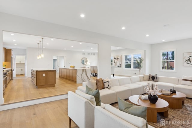 living room featuring light wood-type flooring