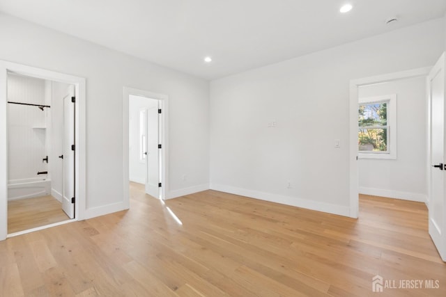 unfurnished bedroom featuring light hardwood / wood-style floors